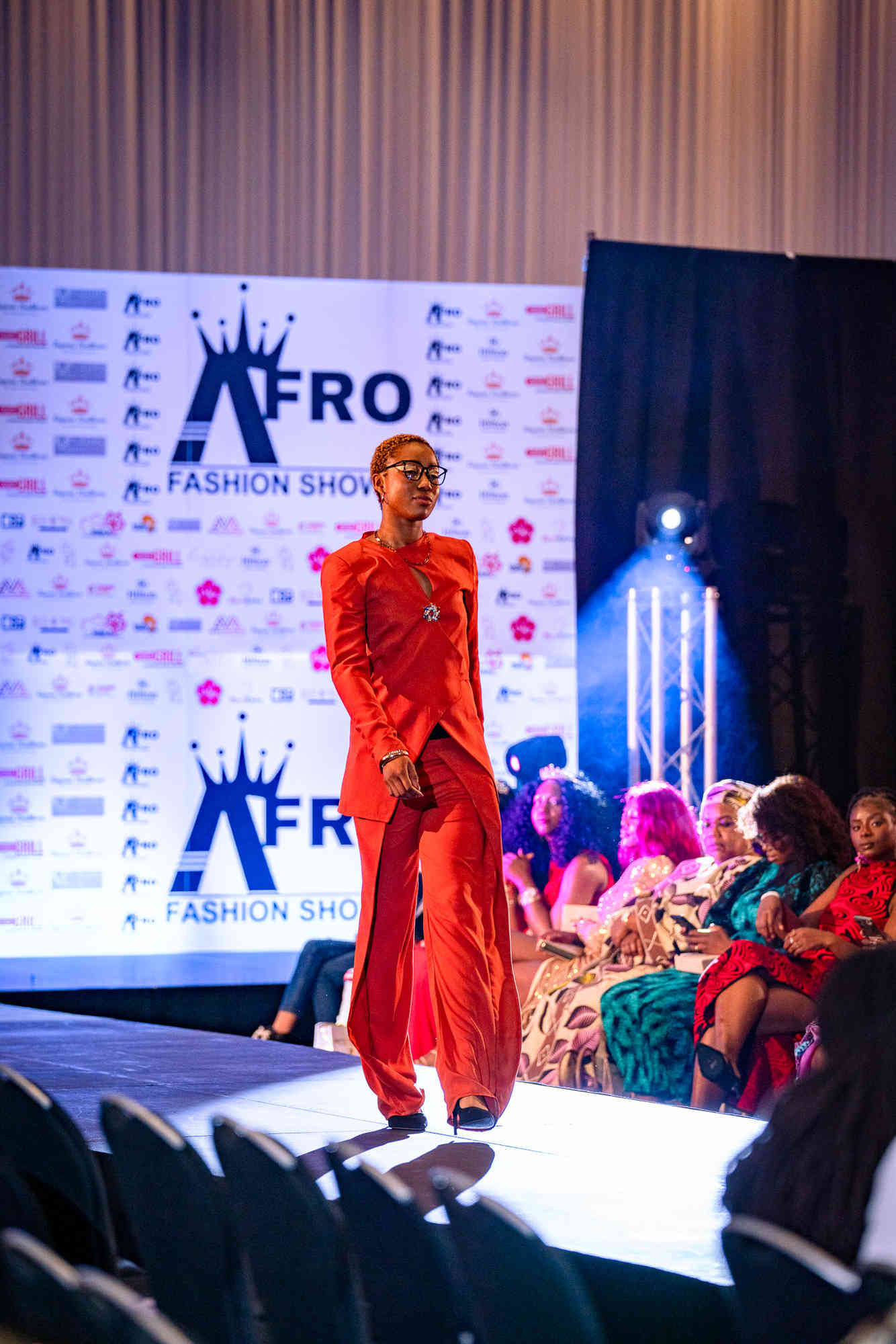 AfroFashion Week runway showcase 1: Model wearing couture fashion design